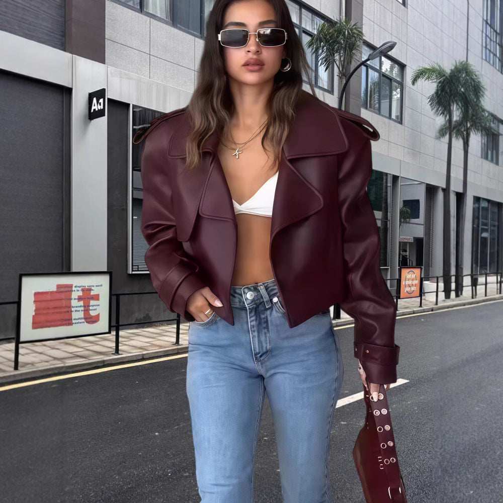 Dulcira | Women's oversized faux leather jacket with statement cuffs