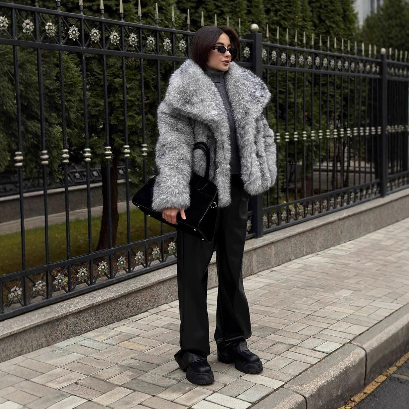 Women luxurious faux fur jacket with voluminous collar