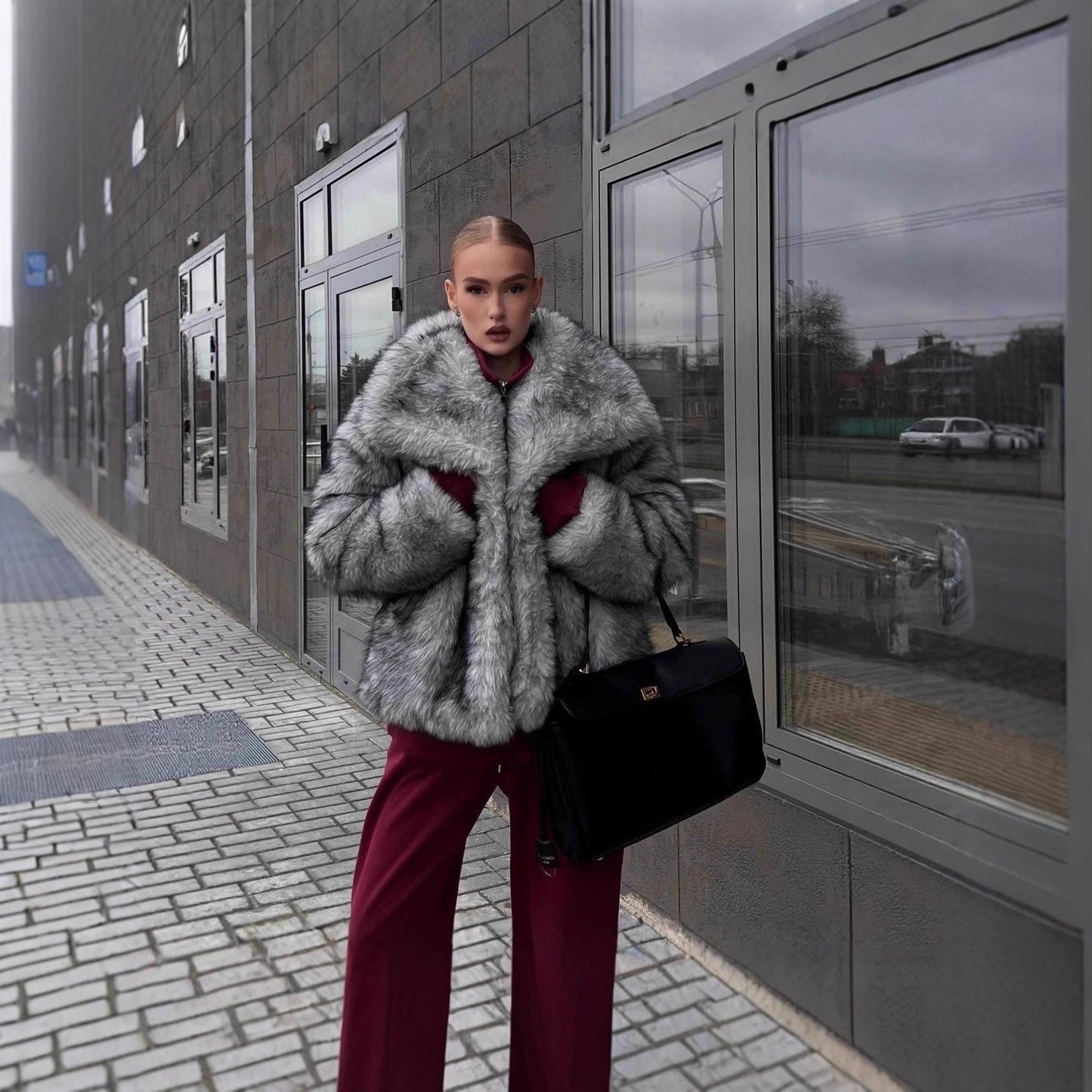 Women luxurious faux fur jacket with voluminous collar