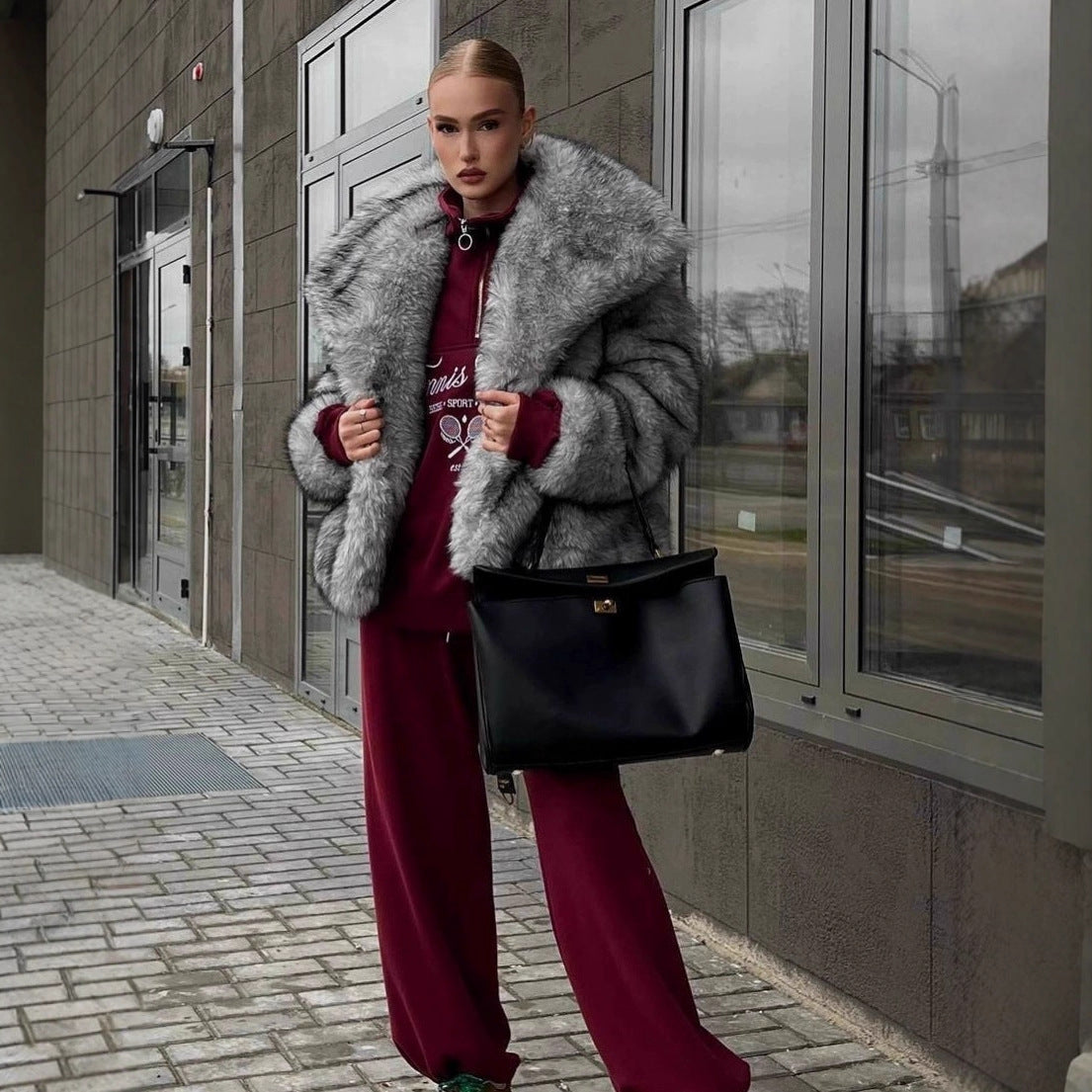 Women luxurious faux fur jacket with voluminous collar