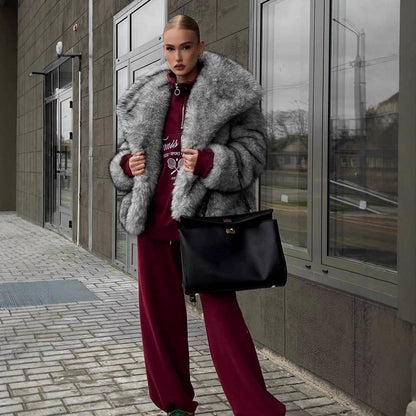 Women luxurious faux fur jacket with voluminous collar