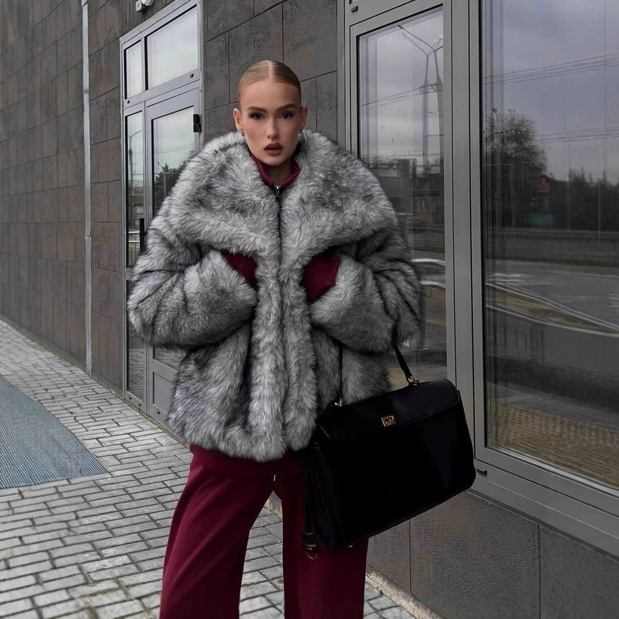 Women luxurious faux fur jacket with voluminous collar
